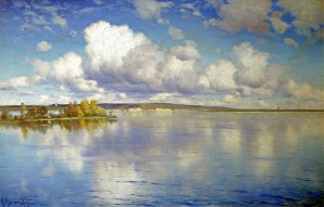 Large lake along a Russian landscape with church in the back